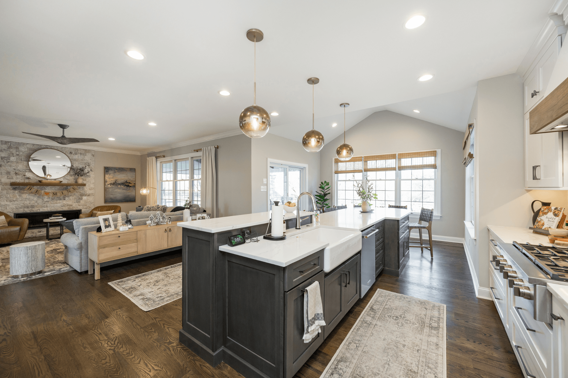 new kitchen renovation with modern updated kitchen island and white marble countertops